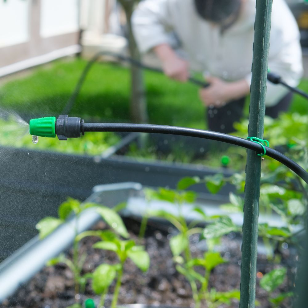 Drip Irrigation System Push-to-Connect with 34 Drip Emitters - Enjoy taking care of your garden with durable, adjustable spray emitters.